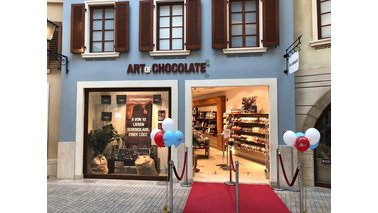 Außenansicht von Art of Chocolate im Moin Outlet